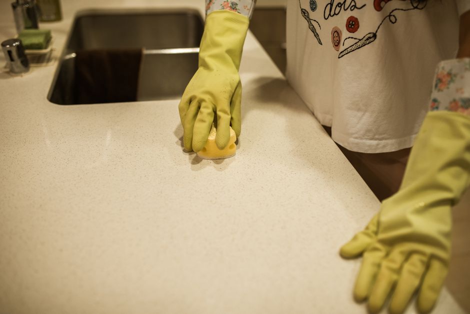 Detailed deep cleaning of a modern kitchen counter